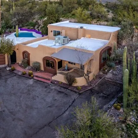 Buy this 4 bed house on 447 East River Road in Tucson, AZ 85704