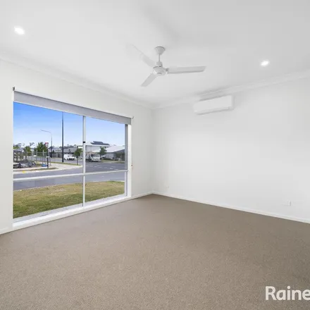Rent this 4 bed apartment on Covella Boulevard in Greenbank QLD 4124, Australia