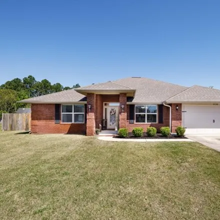 Buy this 4 bed house on 9318 Pouder Lane in Navarre, FL 32566