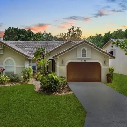 Buy this 5 bed house on 1900 Classic Drive in Coral Springs, FL 33071