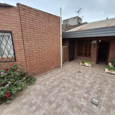 Buy this 3 bed house on Frutas y Verduras Sánchez in Avenida Juan José Castelli, Villa Ministro Rawson