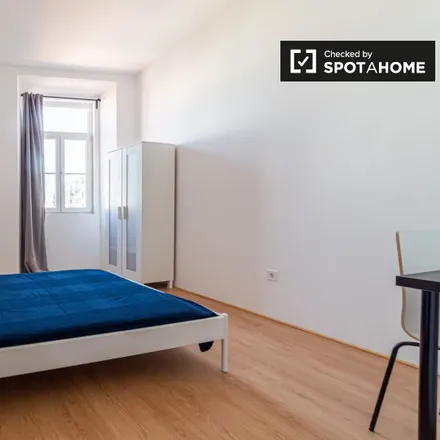 Rent this 9 bed room on CRC Store in Rua António Saúde 7, 1500-081 Lisbon