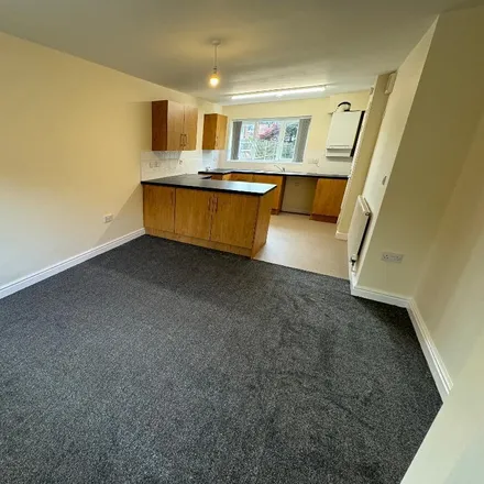 Rent this 3 bed townhouse on Kittybert Avenue in Manchester, M18 8BF