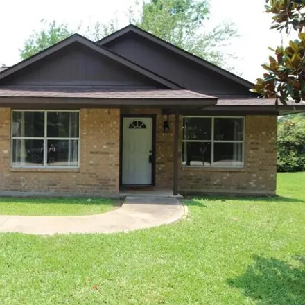 Rent this 3 bed house on 2037 Dewey Street in Waller, TX 77484