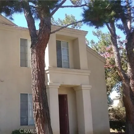 Rent this 2 bed townhouse on 22423 Terrace Pines Drive in Grand Terrace, CA 92313