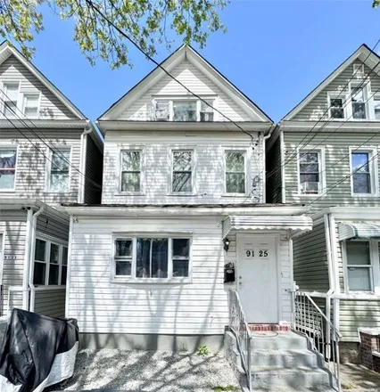 Buy this 5 bed house on 91-25 85th Avenue in New York, NY 11421
