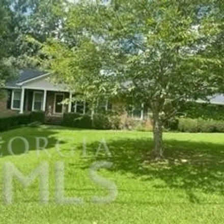 Buy this 4 bed house on 1897 Harbour Oaks Drive Southwest in Snellville, GA 30078