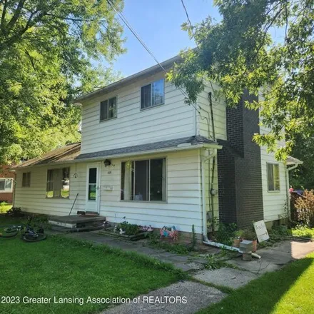 Buy this 4 bed house on 1861 Chestnut Street in Delhi Charter Township, MI 48842