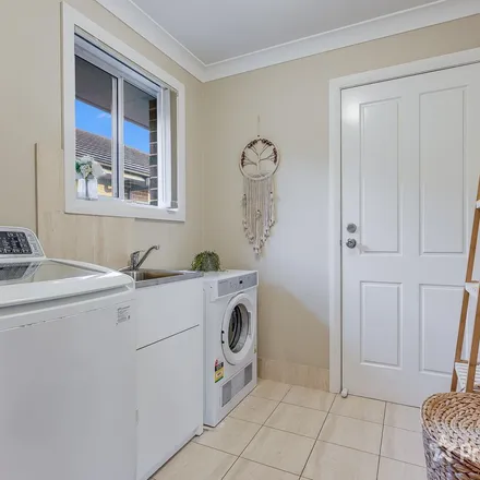 Rent this 4 bed apartment on 2A Duffy Avenue in Gregory Hills NSW 2557, Australia