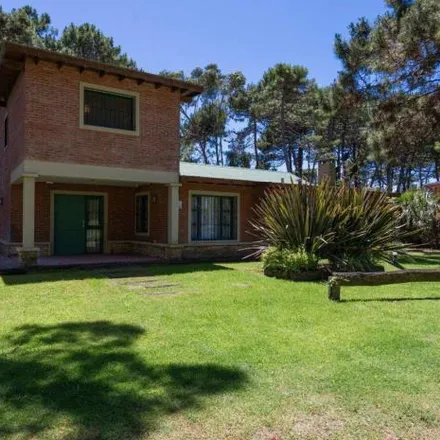 Rent this 4 bed house on Troya in Partido de Pinamar, 7167 Pinamar