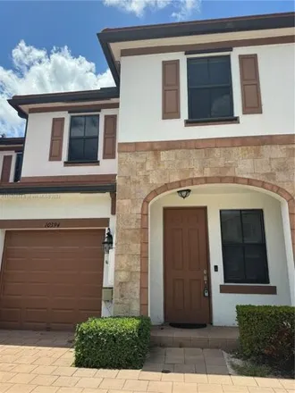 Rent this 3 bed townhouse on 10394 West 34th Court in Hialeah, FL 33018