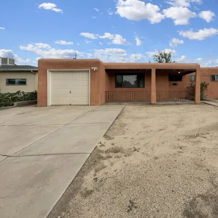 Buy this 3 bed house on 6025 Candelaria Road Northeast in Albuquerque, NM 87110