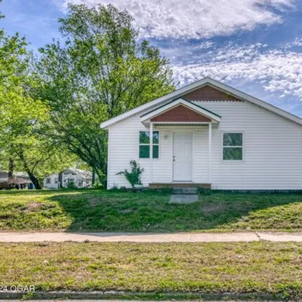 Buy this 3 bed house on 1027 East 18th Street in Joplin, MO 64804