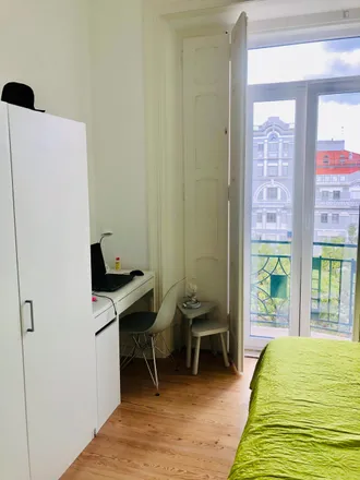 Rent this 4 bed room on Avenida Manuel da Maia 13 in 1000-046 Lisbon, Portugal