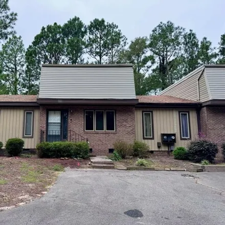 Rent this 2 bed condo on 101 Sandham Ct in West End, North Carolina