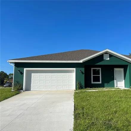 Buy this 4 bed house on 199 Carmelite Avenue Northwest in Palm Bay, FL 32907