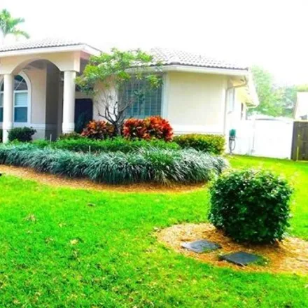 Buy this 5 bed house on 4283 Northwest 67th Way in Coral Springs, FL 33067