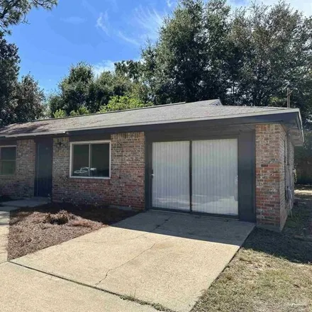 Rent this 3 bed house on 3799 Creighton Road in Pensacola, FL 32504