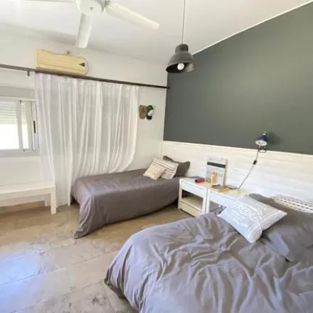 Buy this 5 bed house on 01 - Avenida del Delta in Partido de Tigre, Troncos del Talar