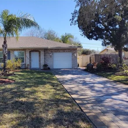 Rent this 3 bed house on 673 Belltower Avenue in Deltona, FL 32725