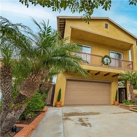 Rent this 4 bed house on 8371 Lomond Drive in Huntington Beach, CA 92646