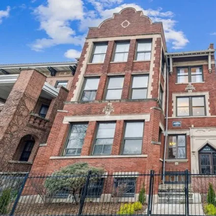 Rent this 4 bed apartment on 5011-5017 South Drexel Boulevard in Chicago, IL 60615