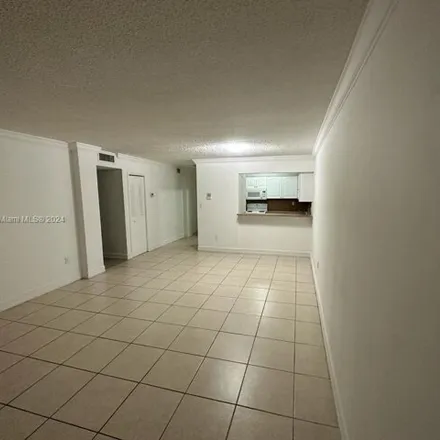 Rent this 2 bed condo on 6930 Northwest 186th Street in Country Club, Miami-Dade County