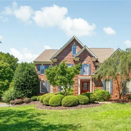 Buy this 5 bed house on 9122 Kalanchoe Drive in Matthews, NC 28105