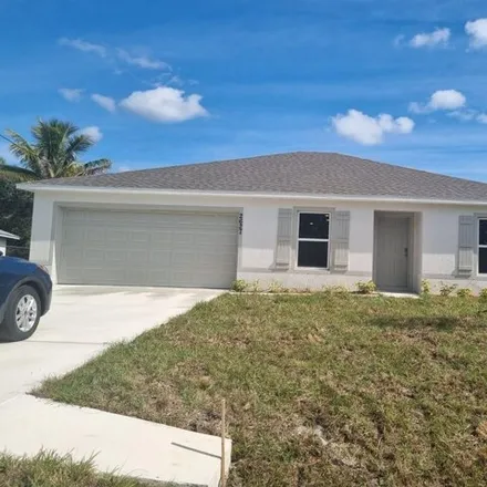 Rent this 3 bed house on 2627 Southwest Harem Circle in Port Saint Lucie, FL 34953
