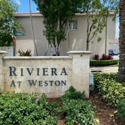 Rent this 3 bed townhouse on 203 Riviera Circle in Weston, FL 33326