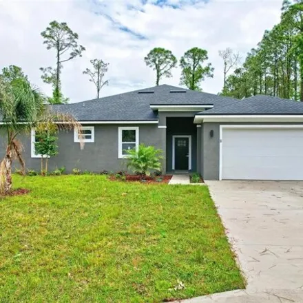Buy this 3 bed house on 97 Pony Express Drive in Palm Coast, FL 32164