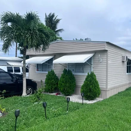 Buy this 4 bed house on Northwest 202nd Street in Royal Country, Miramar
