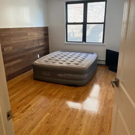 Rent this 3 bed townhouse on 35 Malcolm X Boulevard in New York, NY 11221