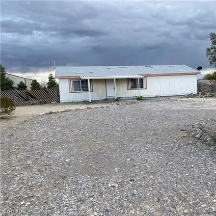 Rent this 3 bed house on 895 Fort Carson Lane in Pahrump, NV 89060