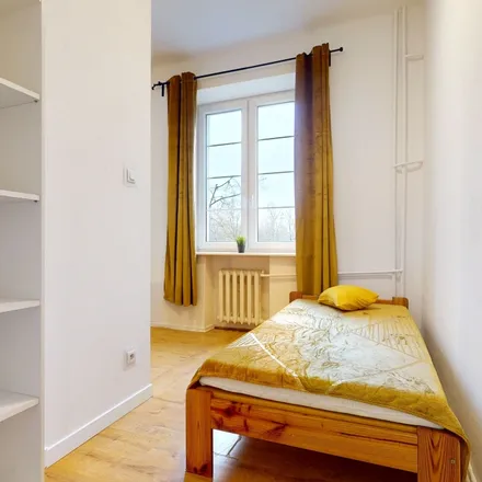 Rent this 8 bed room on Powsińska 24A in 02-903 Warsaw, Poland