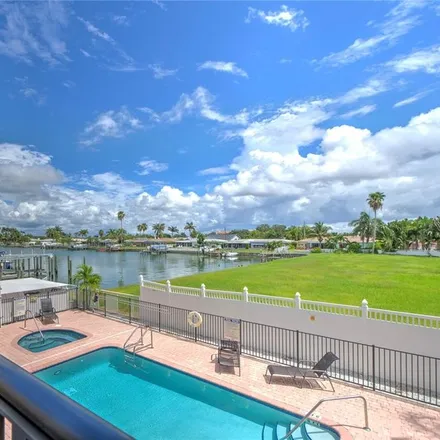 Rent this 3 bed townhouse on 300 Capri Boulevard in Treasure Island, Pinellas County