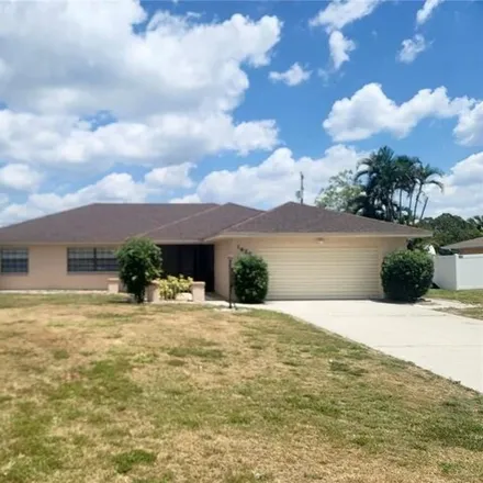 Buy this 3 bed house on 1624 Country Club Parkway in Lehigh Acres, FL 33936