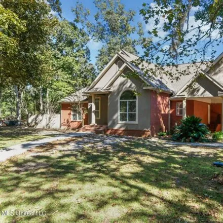 Buy this 3 bed house on 1400 Magnolia Bluff Drive in Gautier, MS 39553