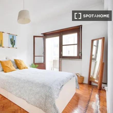 Rent this 3 bed room on Rua António Pereira Carrilho 28 in 1000-047 Lisbon, Portugal