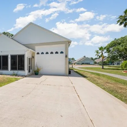 Buy this 3 bed house on 535 Twin Lakes Dr in Titusville, Florida