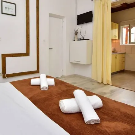 Rent this 1 bed apartment on 23206 Općina Sukošan