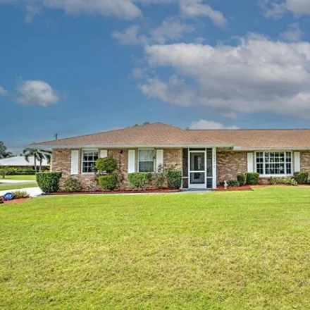Buy this 3 bed house on 1939 Southeast Felton Avenue in Port Saint Lucie, FL 34952