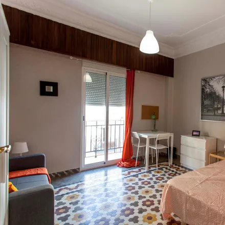 Rent this 8 bed room on Carrer del Guadalaviar in 9, 46009 Valencia