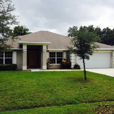 Rent this 3 bed house on 212 Northwest Archer Avenue in Port Saint Lucie, FL 34983