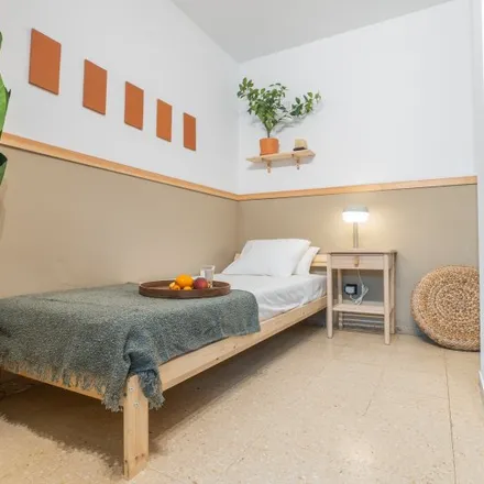 Rent this 7 bed room on Carrer de Puerto Príncipe in 08001 Barcelona, Spain