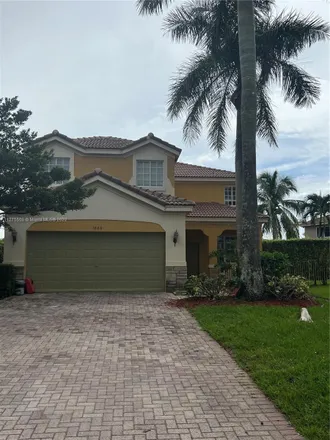 Rent this 5 bed house on 1860 Silverbell Terrace in Weston, FL 33327