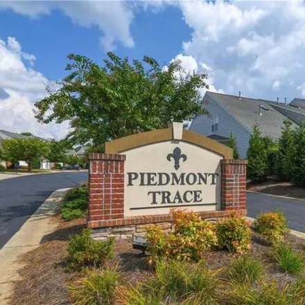 Rent this 3 bed townhouse on 4409 Piedmont Trace Dr