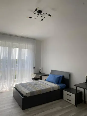 Rent this 3 bed room on Via Concilio Vaticano Secondo in 20157 Milan MI, Italy