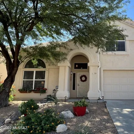 Rent this 3 bed house on 1322 East Volans Place in Oro Valley, AZ 85737