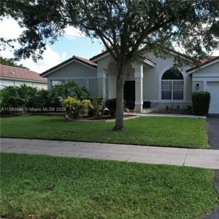 Rent this 3 bed house on 4203 Northwest 54th Street in Coconut Creek, FL 33073